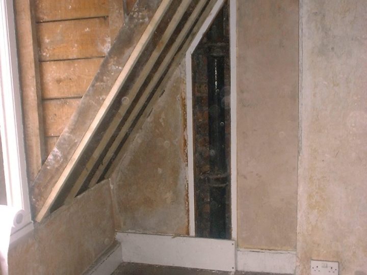 Under the stairs on an upper floor during the works