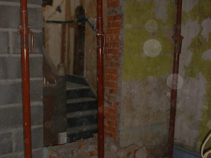 Steel props holding up the structure while openings were made