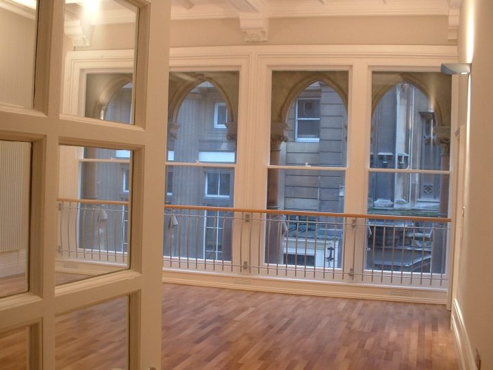 The arcade windows and their railings from inside
