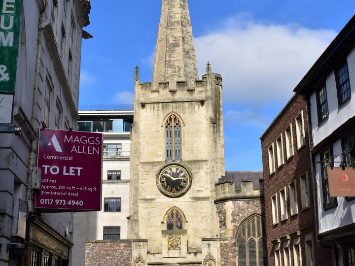 Looking north-west down Broad Street to the church of St John on the Wall, the last surviving of four walled